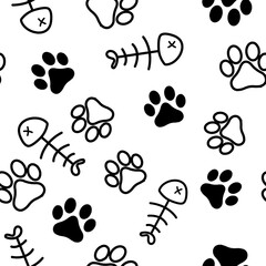 Fototapeta premium seamless pattern black and white paw prints and fish skeleton, cats and dogs