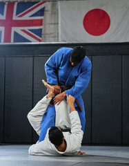 Martial arts, karate or judo fighters and athletes fighting in a competition, match or tournament....