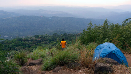 mountain tents in kerala with tourist and beautiful nature view