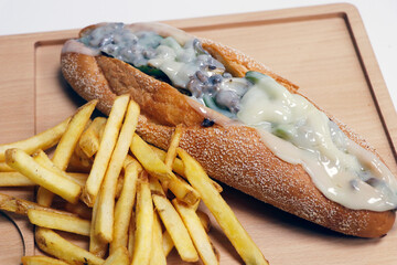 philly cheese sandwich with angus beef and provolone cheese, served with potato chips