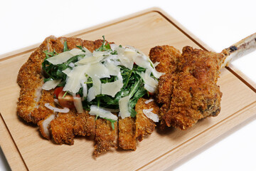 Veal Milanese, or veal alla Milanese, is an Italian popular dish,traditionally prepared with a veal...