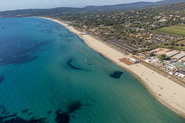Aerial view of legendary Pampelonne beach near Saint-Tropez, summer vacation on white sandy beaches of French Riviera, France