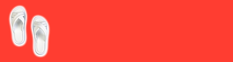 Women's summer white slippers on a red background. Slippers. Horizontal image. Banner for insertion into site. Place for text cope space.