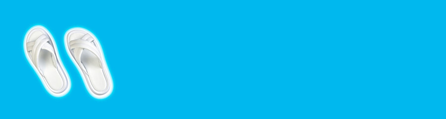 Women's summer white slippers on a blue background. Slippers. Horizontal image. Banner for insertion into site. Place for text cope space.