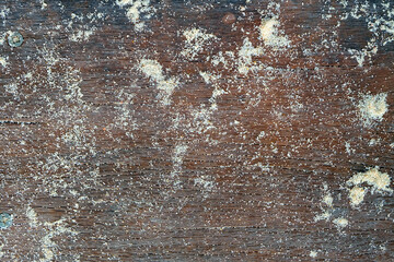sand on rusty wood background