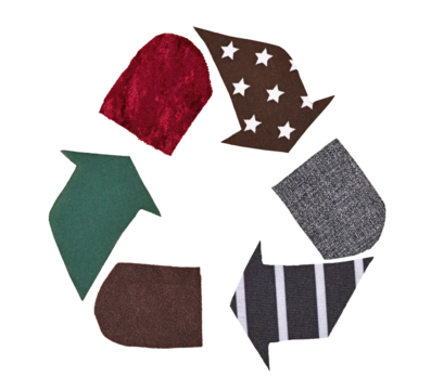 Recycling arrow symbol made from old textile pieces on transparent background