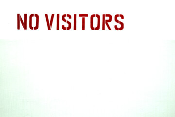 the inscription on a white background in red letters no visitors