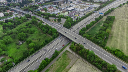 View of the highway, flyover bridge, and city - aerial photography 