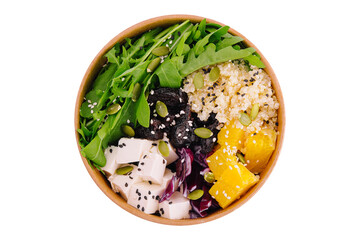 Healthy buddha bowl with quinoa, arugula, feta cheese and fruit