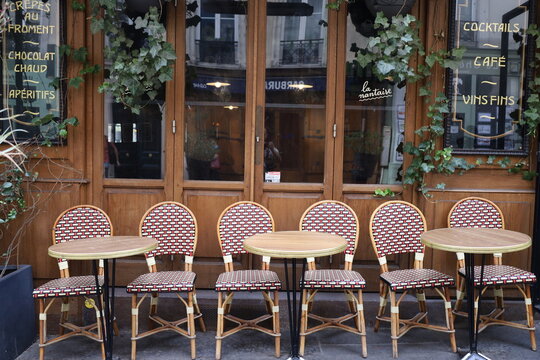 French Lifestyle , Typical Parisian Bistrot And Cafe Terrace On The Streets