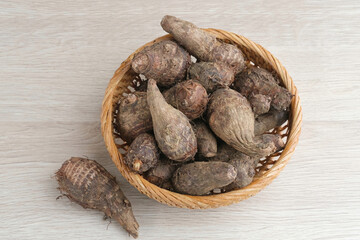 Taro, Talas belitung, kimpul or bentul, are starchy tubers that can be eaten. Served boiled or steamed.