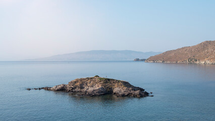 Fototapeta na wymiar sea ​​view with small island, front view