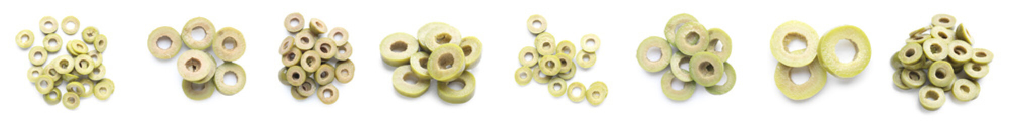 Set of cut green olives isolated on white
