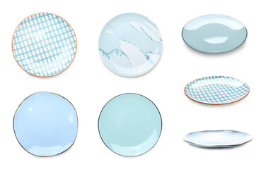 Set of empty ceramic plates isolated on white