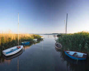 Sunset over lake Balaton with boats