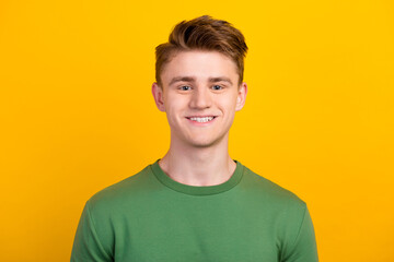 Portrait of young cheerful man in casual cloth smiling isolated bright background. Concept of youth fashion facial emotions lifestyle