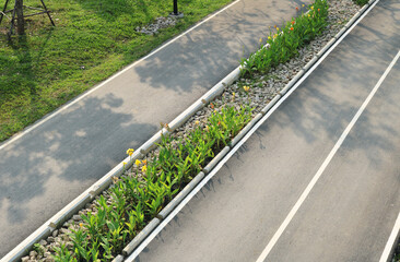 Beautiful asphalt road with traffic island view from drone.	