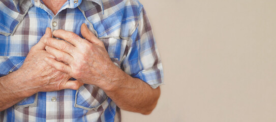  Senior man suffering from severe chest pain.  Myocardrial infarction disease. Heart attack. Health...