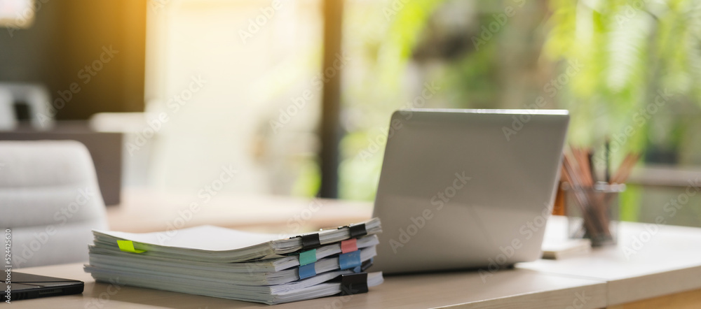 Poster closeup office business workplace with laptop on desk computer background document on table copy spa
