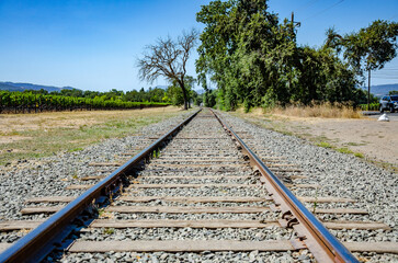 Fototapeta premium Railway lines disappearing into the distance