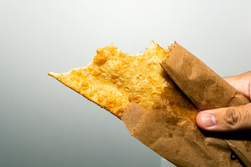 bitten brazilian pastel, traditional fried snack