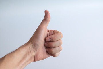 man making thumbs up sign.isolated on white background.