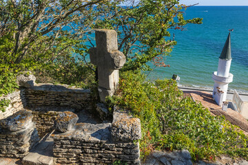 Cross and Quiet Nest Palace of Queen Marie in Palace park and Botanic garden in Balchik city, Bulgaria