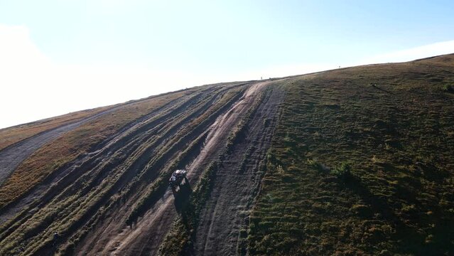 aerial view of trail road to the top of carpathian mountains