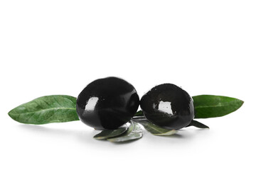 Tasty black olives and leaves on white background