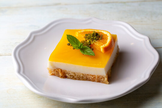 A delicious Turkish dessert; Etimek dessert with orange, orange cake, orange milk cake (Turkish name; Portakalli etimek tatlisi)
