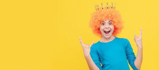happy selfish child girl in curly wig and princess diadem, happiness. Funny teenager child in wig, party poster. Banner header, copy space.