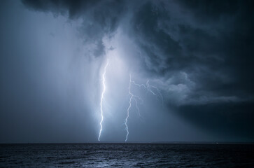 Lightning bolts strike during a thunderstorm in Florida.