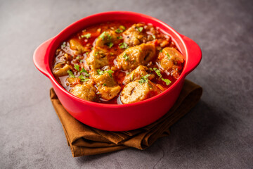 Punjabi soya chaap gravy or dhaba style soya chap masala sabzi served with naan