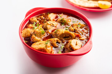 Punjabi soya chaap gravy or dhaba style soya chap masala sabzi served with naan