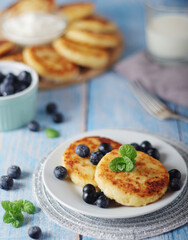 Cottage cheese pancakes - traditional Russian syrniki	
