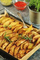 A tray with potatoes backed in oven	