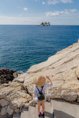 Hand gesture. The woman waves her hand.
