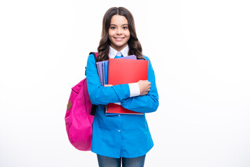 Back to school. Schoolgirl student with school bag backpack hold book on isolated studio background. School and education concept. Teenager girl in school uniform.
