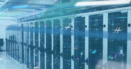 Image of lines flickering and markers moving over computer servers in background