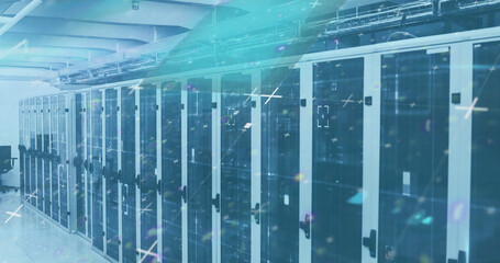Image of lines flickering and markers moving over computer servers in background