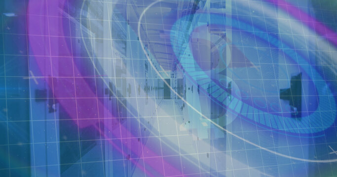 Image of scope scanning and data processing over computer servers and grid in background