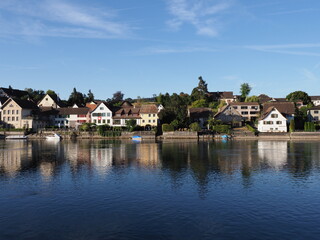 Fototapeta na wymiar Village at Rhine River in european STEIN AM RHEIN town in SWITZERLAND