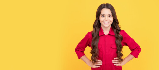 being self confident. happy childhood. cheerful teen girl with long curly hair. kid wear red shirt. Child face, horizontal poster, teenager girl isolated portrait, banner with copy space.