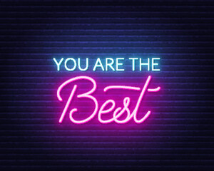 Fototapeta na wymiar You are the Best neon quote on a brick wall.