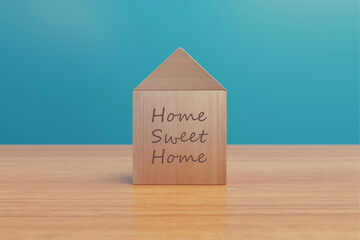 Home sweet home wooden blocks on a table - Cute design for welcoming back home with love in family