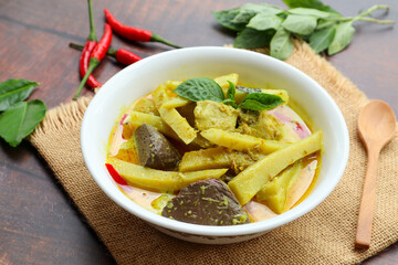 Chicken green curry - Thai food at close up view on sackcloth , Thai food called Kang Keow Wan Gai