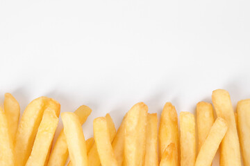 Delicious french fries on white background, flat lay. Space for text