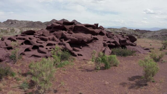 Beautiful Katutau mountains in Altyn-emel National park in Kazakhstan at bright summer day. Aerial view of unique sedimentary rocks in the wild.