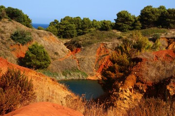 Italy, Salento: Small bauxite lake near Otranto.
