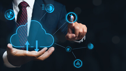 Businessman holding virtual icon cloud server computing connection data information in hand.